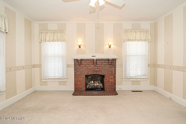 unfurnished living room with light carpet, a brick fireplace, and crown molding