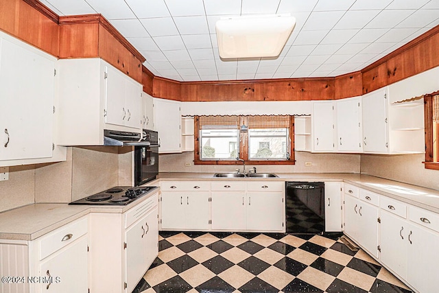 kitchen with gas stovetop, black dishwasher, white cabinets, and light tile floors