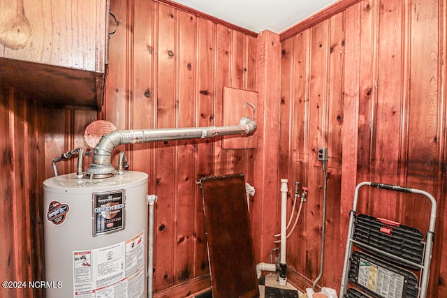 utility room with water heater