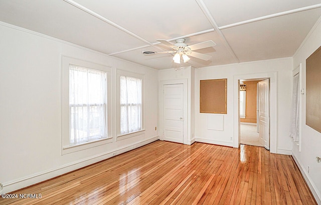 spare room with ceiling fan and light hardwood / wood-style flooring