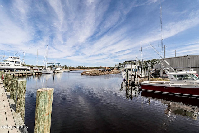 dock area featuring a water view