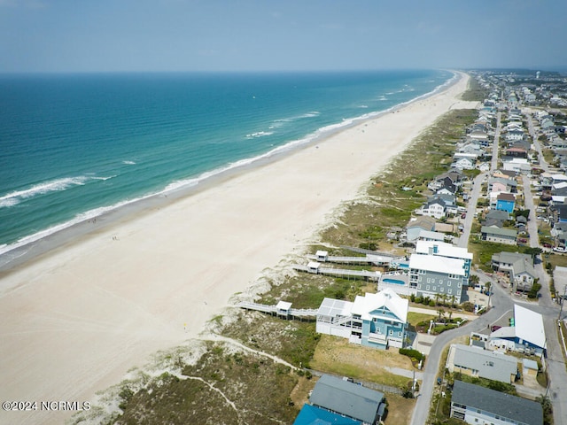 aerial view featuring a beach view and a water view