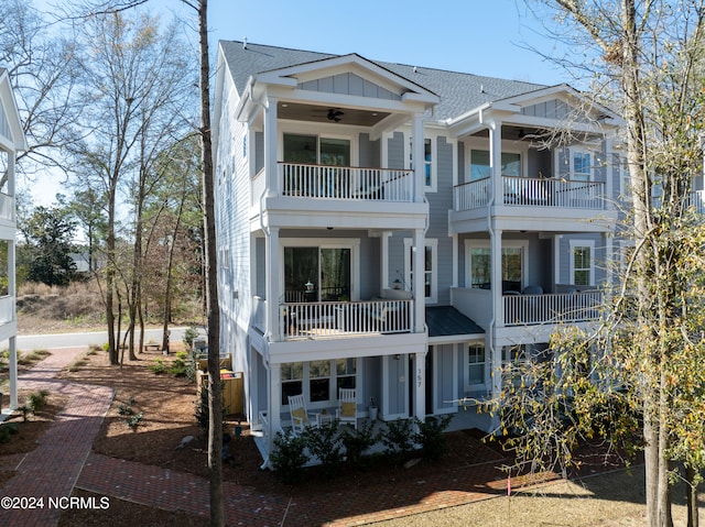 back of house with a balcony