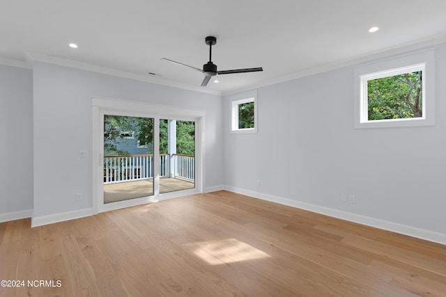 unfurnished room with light hardwood / wood-style flooring, ceiling fan, and ornamental molding