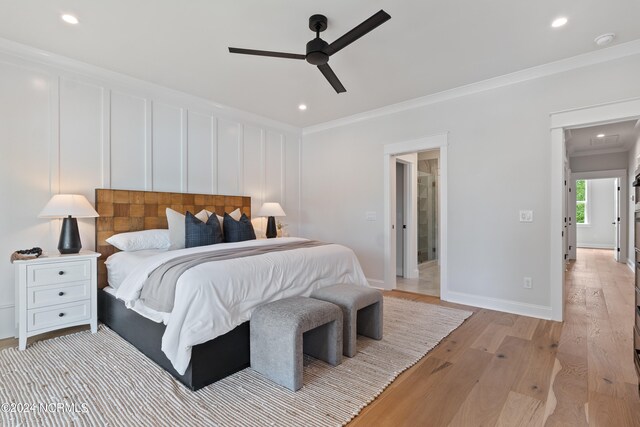 bedroom with ceiling fan, light hardwood / wood-style flooring, and ornamental molding