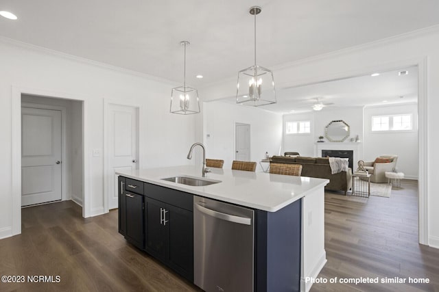 kitchen with gas range oven, light countertops, stainless steel microwave, decorative backsplash, and ornamental molding