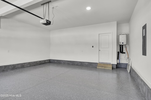 garage with recessed lighting, baseboards, a garage door opener, and electric panel
