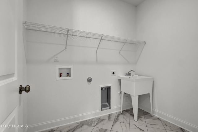 clothes washing area with laundry area, hookup for a washing machine, marble finish floor, baseboards, and hookup for an electric dryer