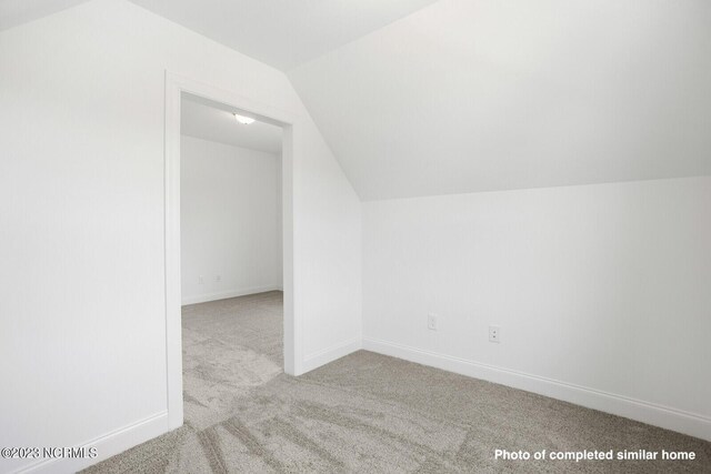 unfurnished bedroom with carpet floors, a closet, visible vents, and baseboards