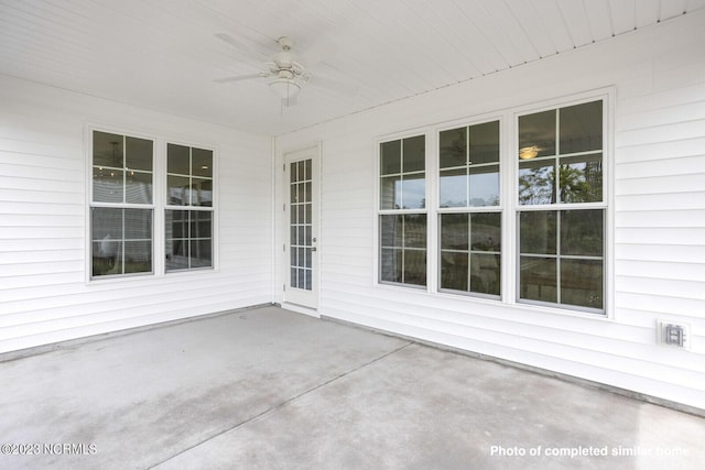 view of patio featuring ceiling fan