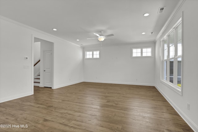 spare room with plenty of natural light, recessed lighting, and ceiling fan