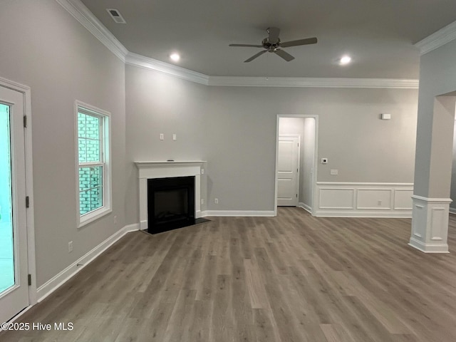 1114 Natal Dr SE, Bolivia, NC 28422 - unfurnished living room with crown molding, a fireplace with flush hearth, ceiling fan, wood finished floors, and recessed lighting