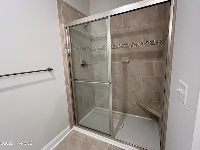 1114 Natal Dr SE, Bolivia, NC 28422 - full bath featuring a shower stall and baseboards