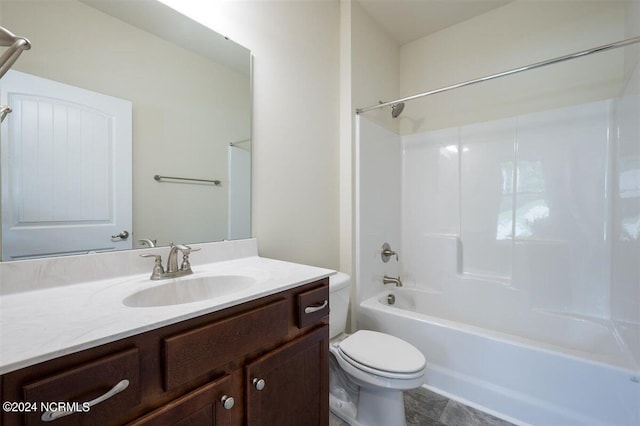 full bathroom with tub / shower combination, vanity, and toilet