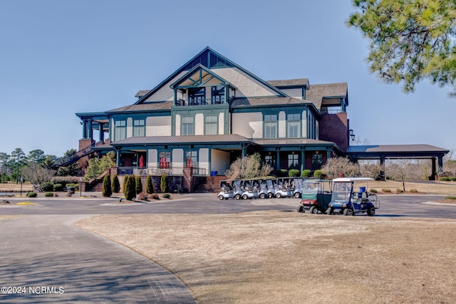 view of front of house featuring a carport