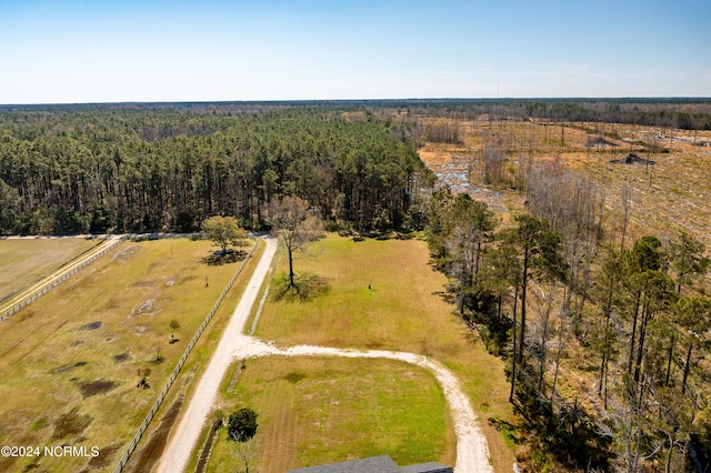 birds eye view of property with a rural view