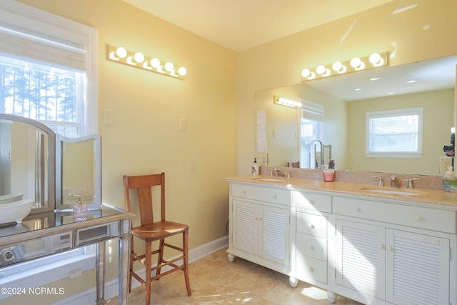 bathroom with tile floors and dual vanity