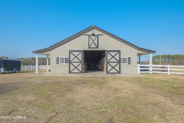 view of shed / structure with a lawn