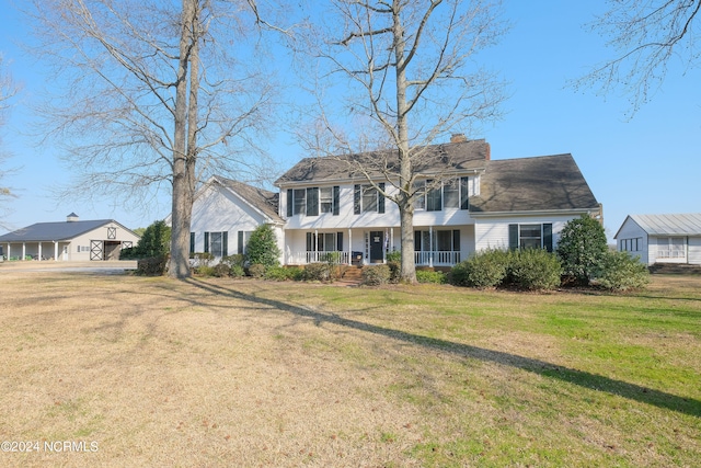 view of front of home with a front yard