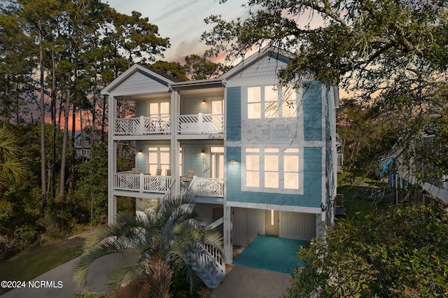 view of front of property with a balcony