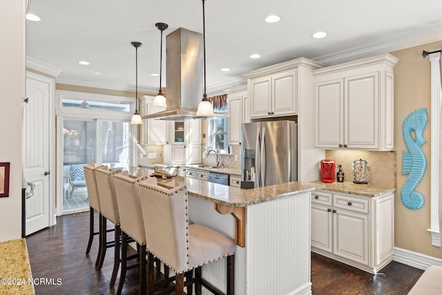 kitchen featuring hanging light fixtures, backsplash, dark hardwood / wood-style floors, appliances with stainless steel finishes, and island range hood