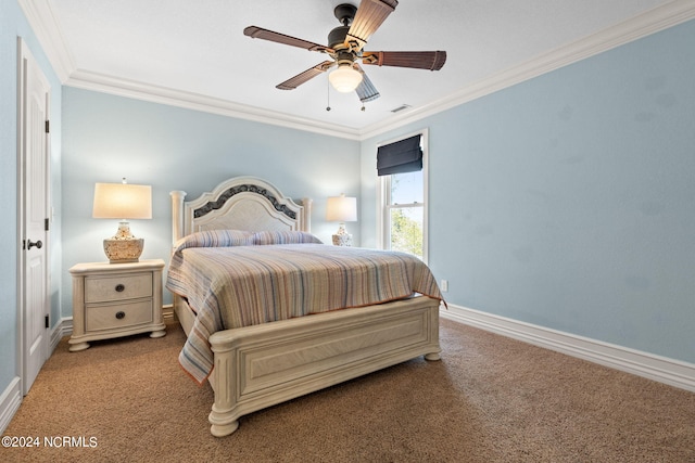 carpeted bedroom featuring ornamental molding and ceiling fan