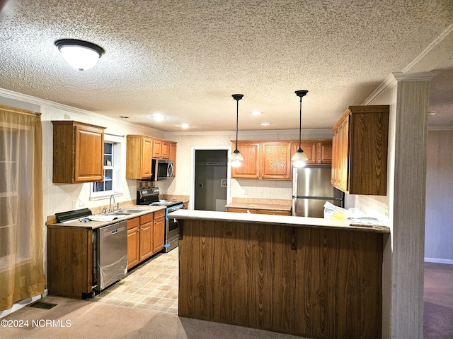 kitchen with ornamental molding, light carpet, decorative light fixtures, and stainless steel appliances