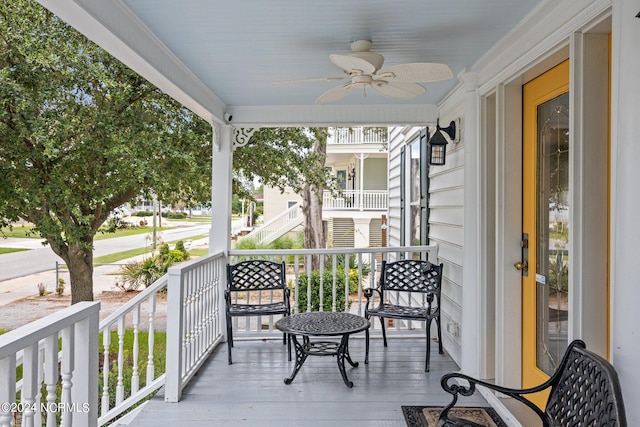 wooden terrace with ceiling fan