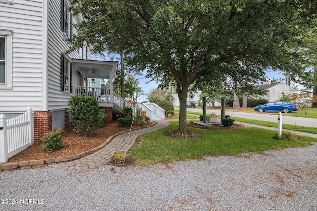 view of yard with a porch