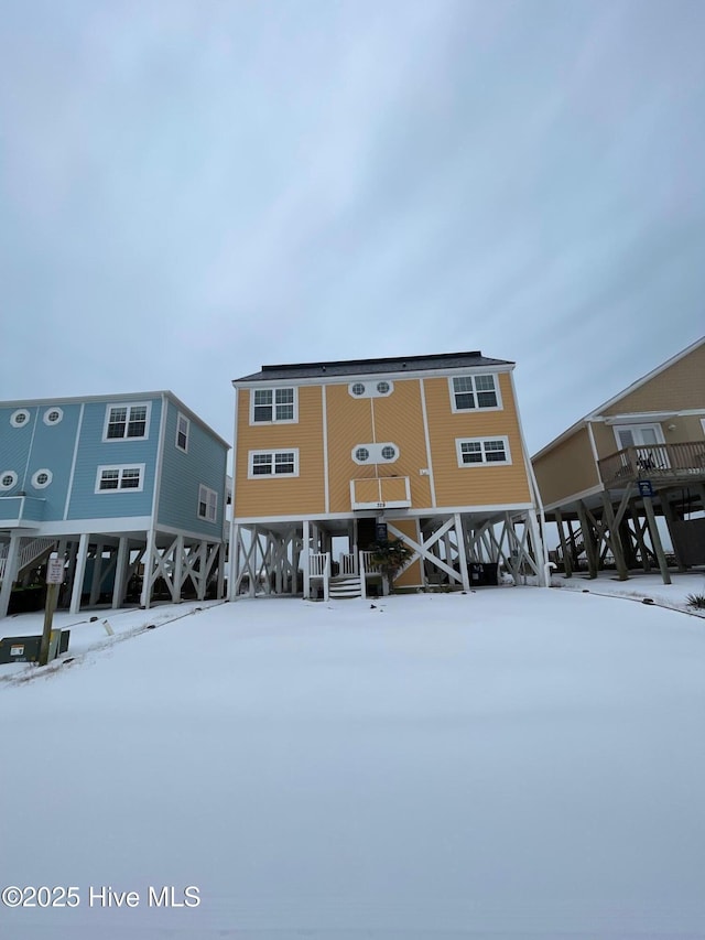 view of snow covered property