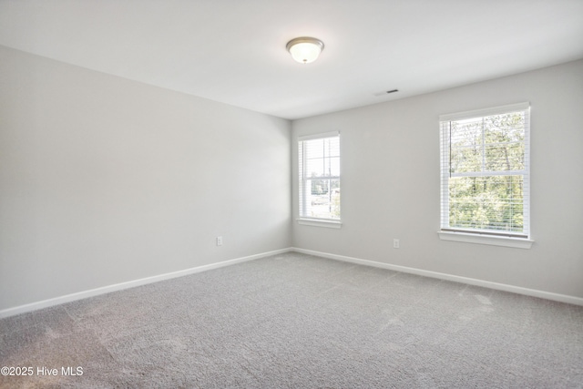 view of carpeted spare room