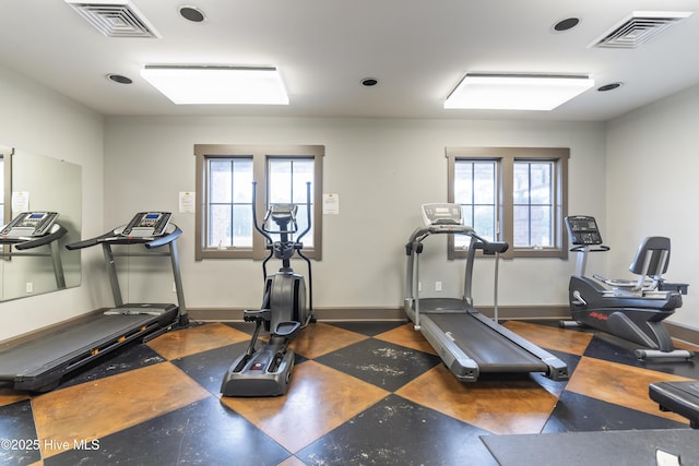 workout area featuring plenty of natural light