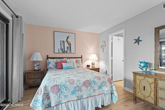 bedroom featuring light hardwood / wood-style floors