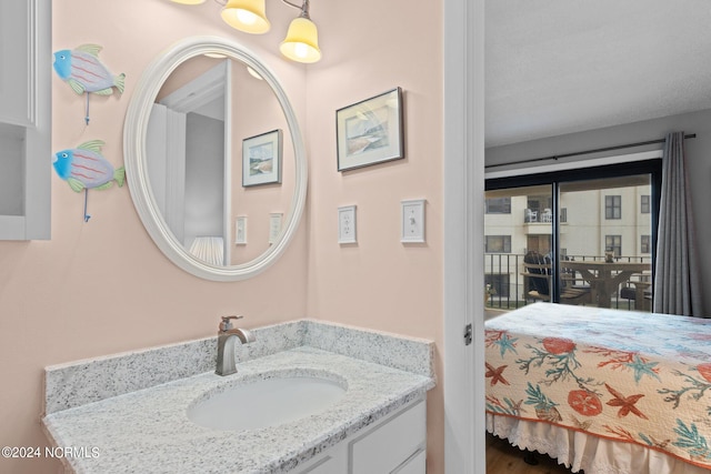 bathroom featuring vanity and wood-type flooring