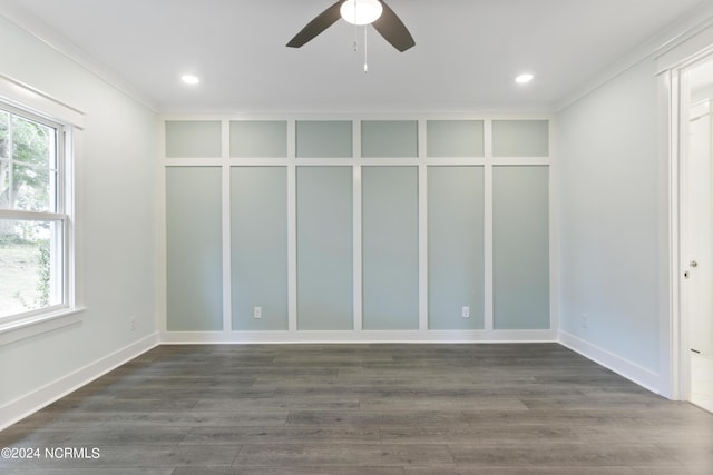 2058 Greenside Manor Dr, Ocean Isle Beach, NC 28469 - empty room featuring plenty of natural light, a ceiling fan, dark wood-style floors, and ornamental molding