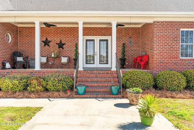 view of exterior entry featuring a porch