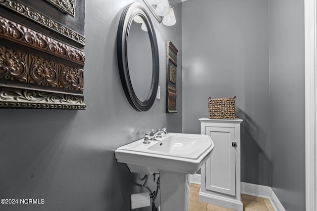 bathroom featuring tile flooring