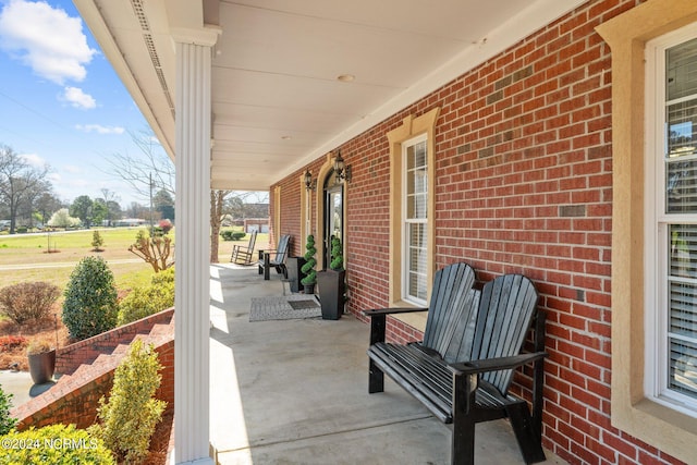 view of terrace featuring a porch