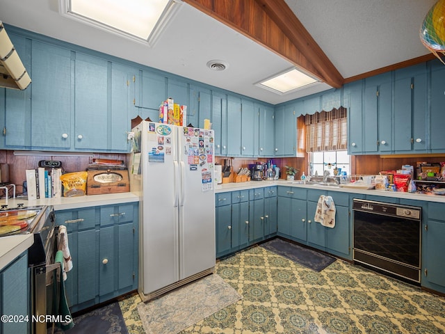 kitchen with blue cabinetry, white fridge, black dishwasher, and exhaust hood