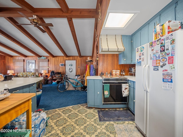 kitchen with ceiling fan, beamed ceiling, blue cabinets, white refrigerator, and extractor fan