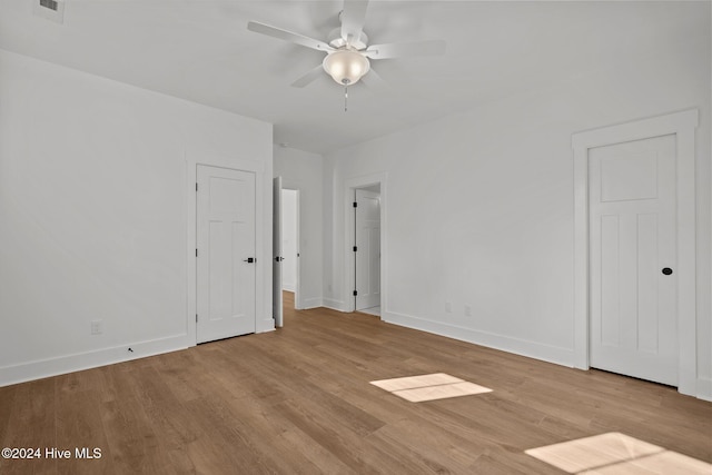 4865 Scarlet Sage Way, Shallotte, NC 28470 - empty room featuring ceiling fan and wood finished floors