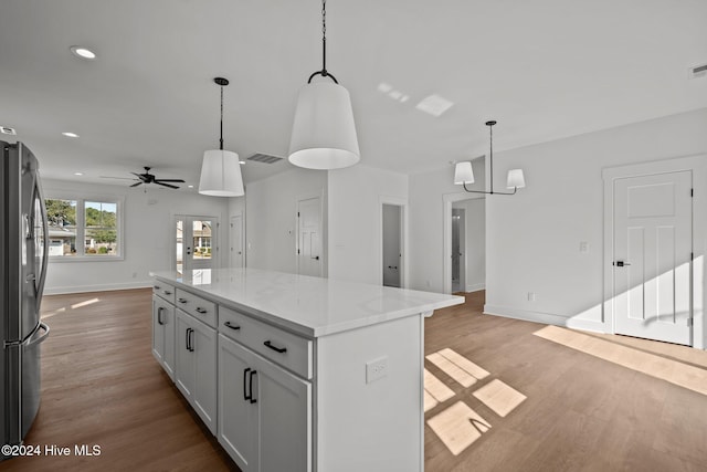 4865 Scarlet Sage Way, Shallotte, NC 28470 - kitchen featuring freestanding refrigerator, ceiling fan, light wood finished floors, a center island, and recessed lighting