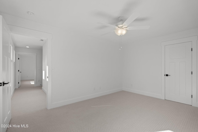 4865 Scarlet Sage Way, Shallotte, NC 28470 - empty room featuring a ceiling fan and light colored carpet