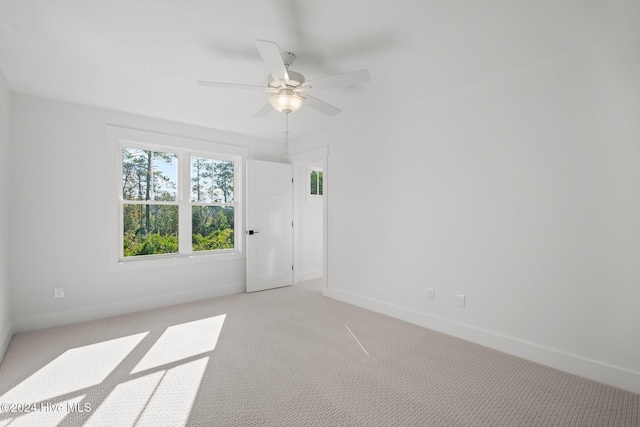 4865 Scarlet Sage Way, Shallotte, NC 28470 - spare room with light carpet and ceiling fan