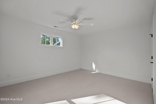 4865 Scarlet Sage Way, Shallotte, NC 28470 - spare room featuring a ceiling fan and carpet floors