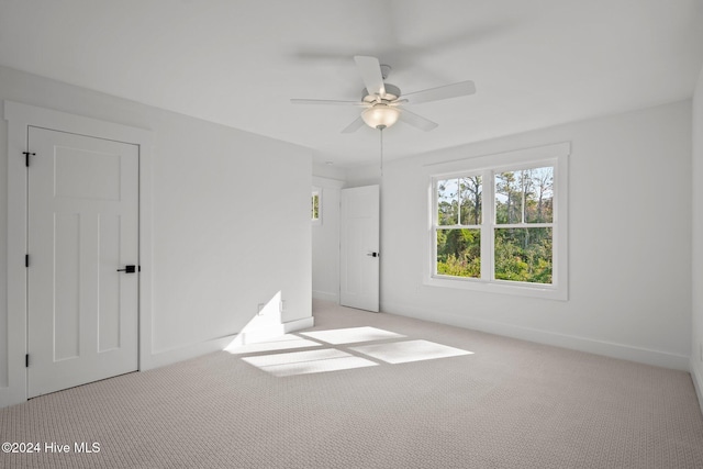 4865 Scarlet Sage Way, Shallotte, NC 28470 - unfurnished bedroom with carpet flooring and a ceiling fan
