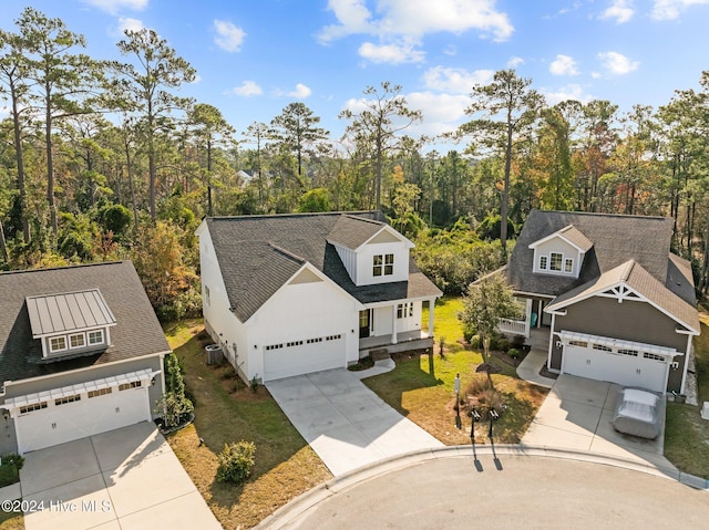 4865 Scarlet Sage Way, Shallotte, NC 28470 - aerial view of property and surrounding area with a forest