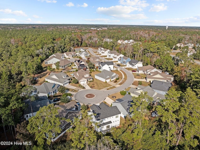 4865 Scarlet Sage Way, Shallotte, NC 28470 - view of property location featuring a heavily wooded area and nearby suburban area