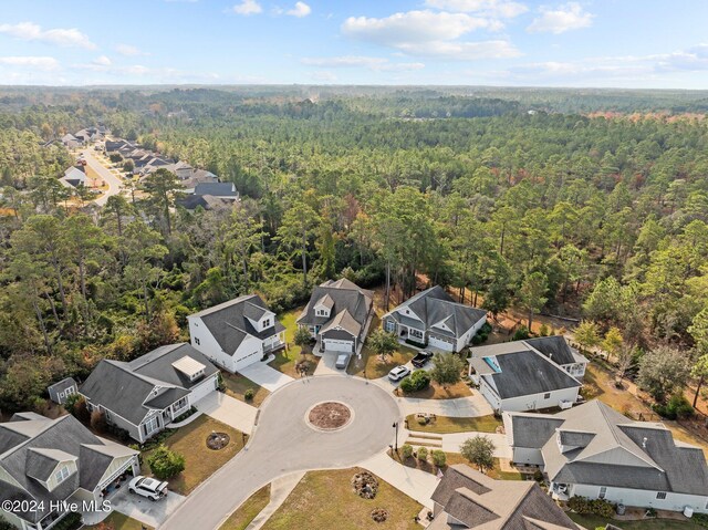 4865 Scarlet Sage Way, Shallotte, NC 28470 - aerial perspective of suburban area featuring a forest
