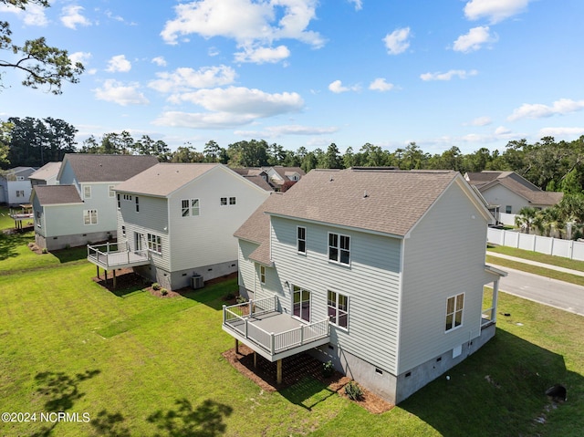 back of house featuring a shingled roof, crawl space, a wooden deck, and a residential view